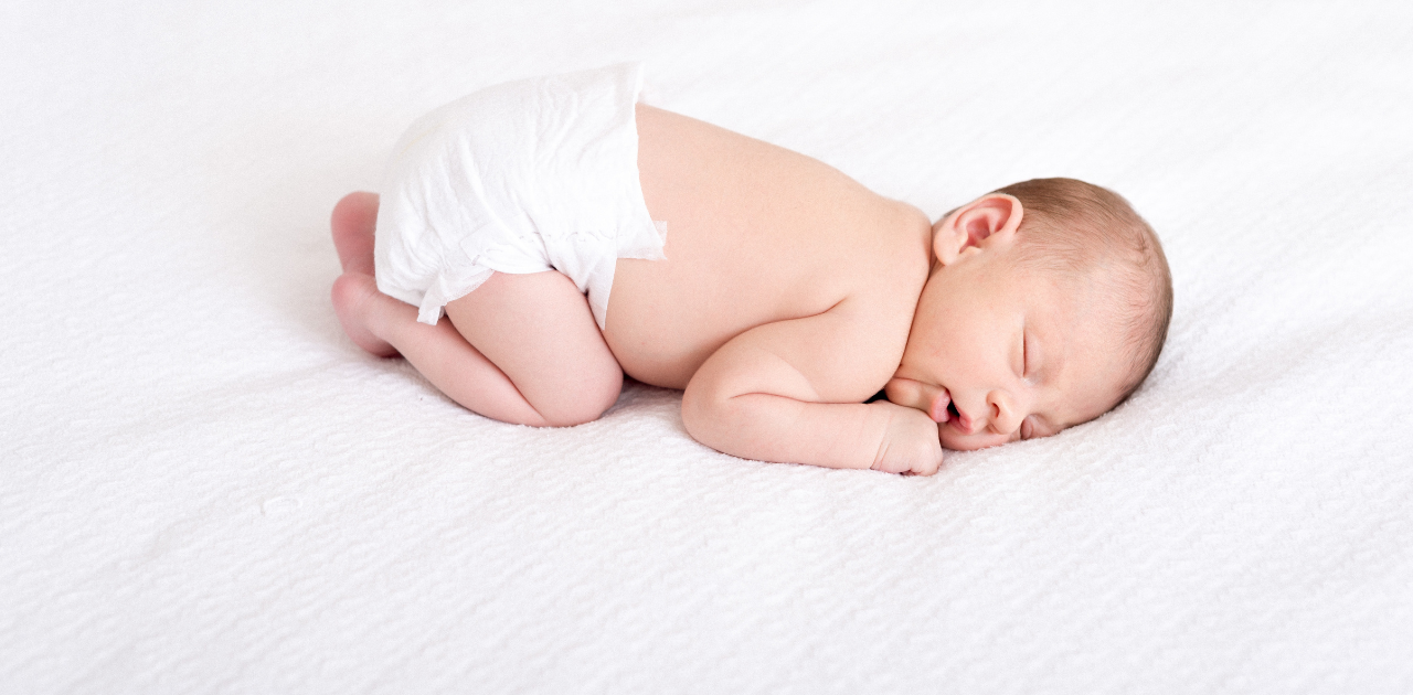 why do babies sleep with their butt in the air