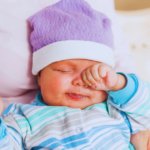 do babies rub their eyes when teething
