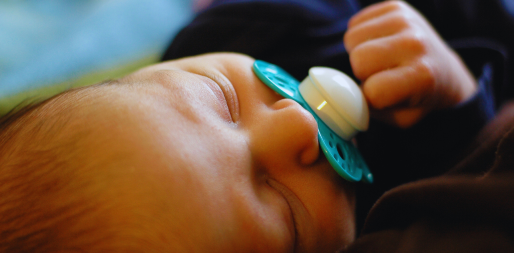 can a newborn sleep with a pacifier